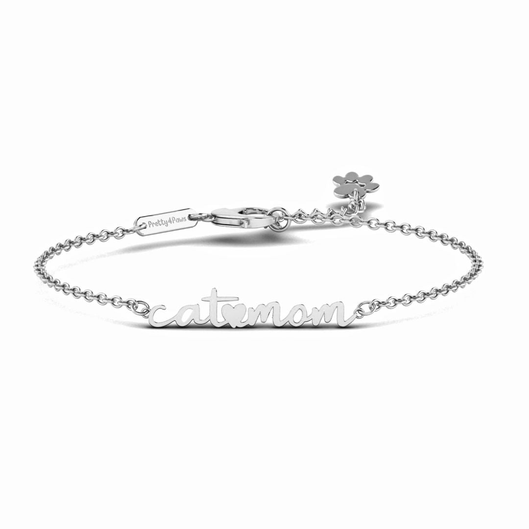 Product image is showing a stainless steel bracelet with cat mom letters and heart in the middle.
