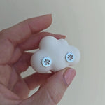 Video showing silver round stud earrings with the paw print in the middle.