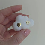 Gold paw print stud earrings, a subtle and elegant jewellery piece for everyday wear.