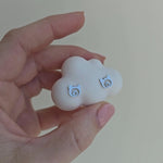 A video showing silver stud earrings in the shape of cat head with little heart inside.