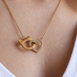 Interlocking Cat Love Necklace featuring a heart linked with the Pretty4Paws signature cat-head shape.