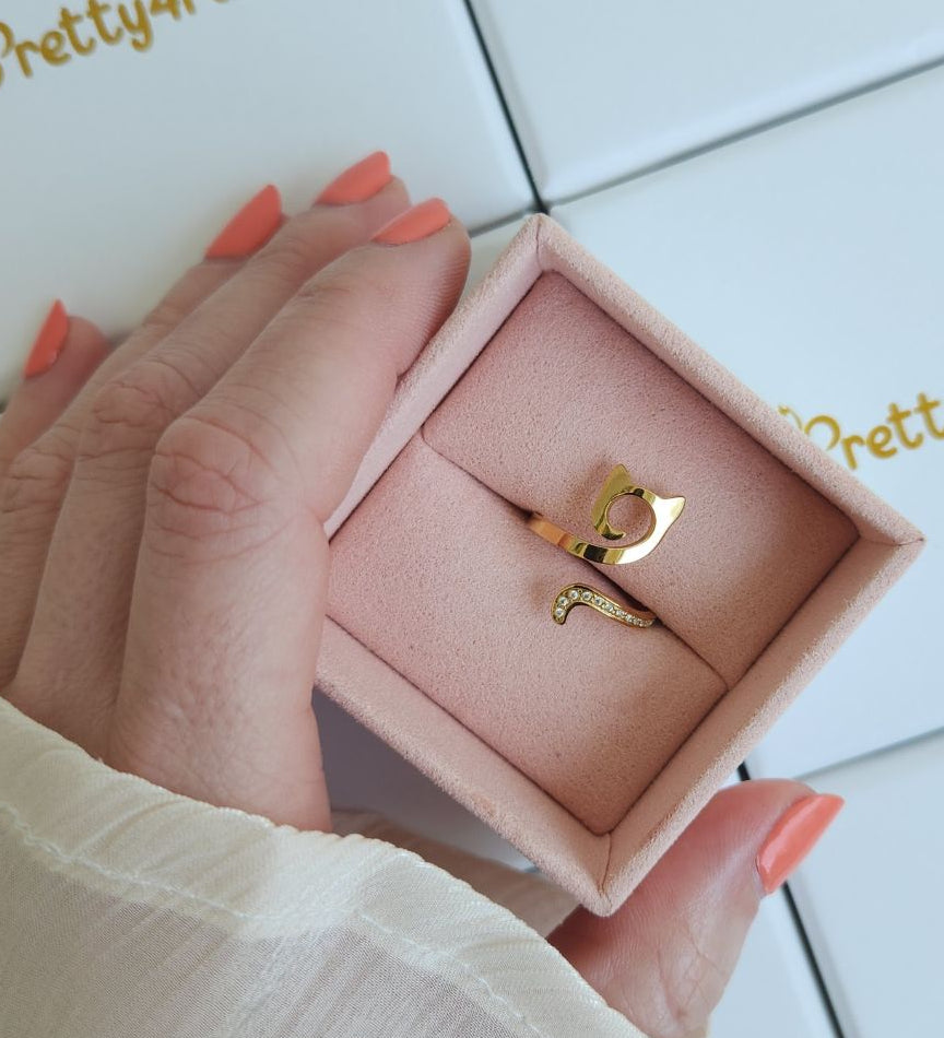Elegant gold-plated cat ring displayed in jewellery box, perfect for cat lovers.