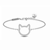 A rendered image showing a silver chain bracelet featuring a cat-shaped outline charm paved with small clear stones, shown on a clean white background. The clasp is engraved with the brand name 'pretty4paws".