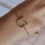 Video showing Magical Meow gold bracelet closely on the woman's wrist. 